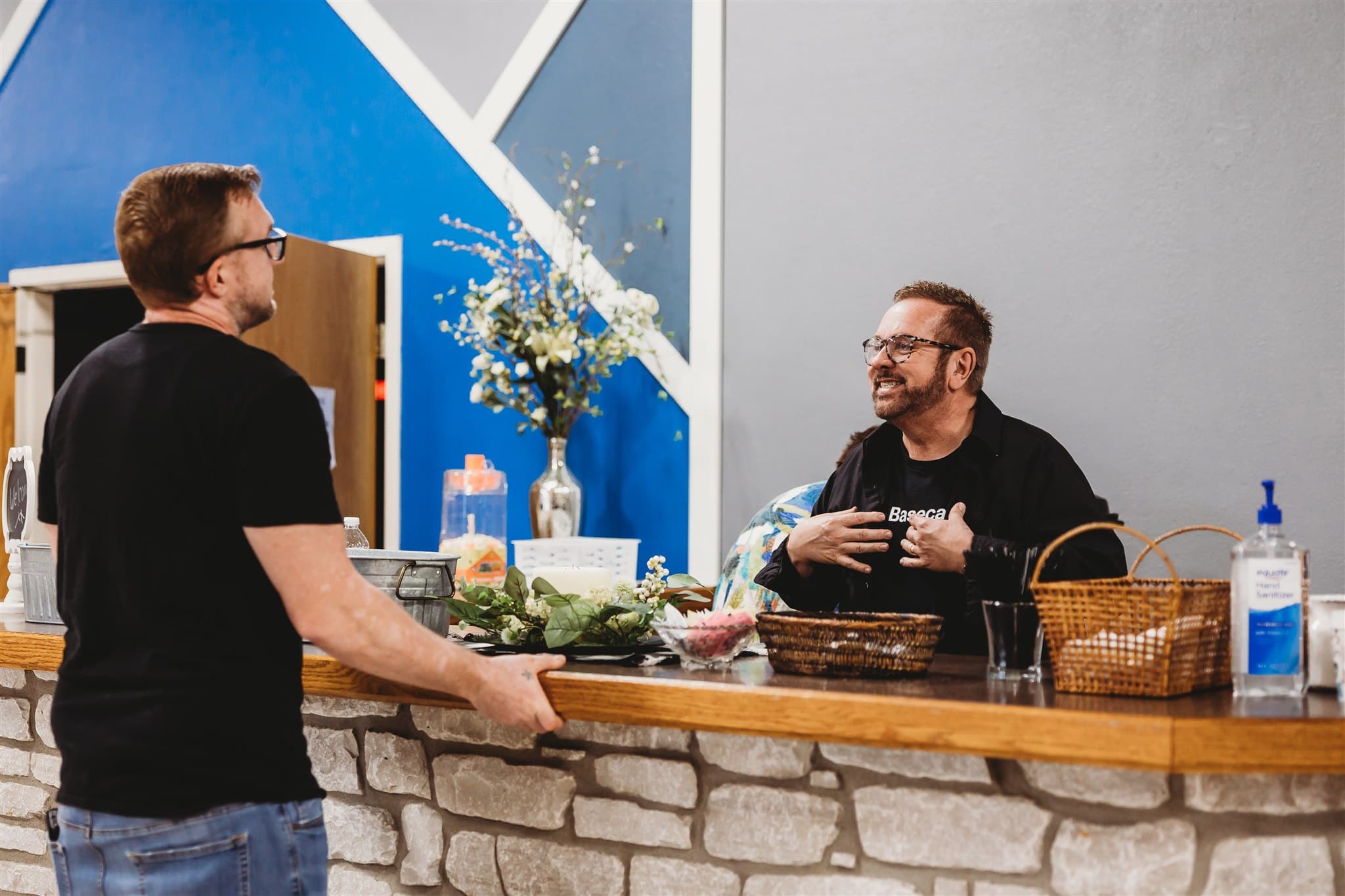 A volunteer at the coffee bar